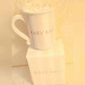 NIB. MARY KAY PINK, GOLD AND WHITE STRIPED MUG.